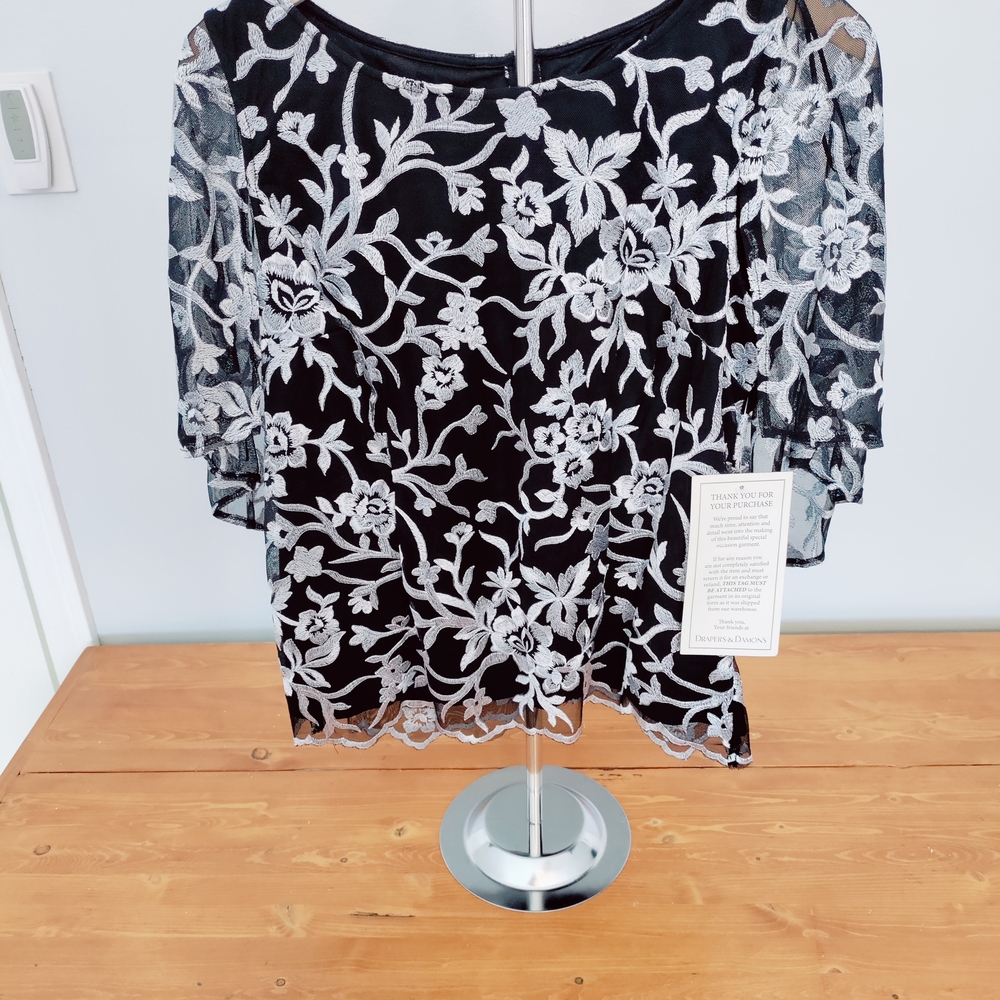 Elegant Black and White Floral Lace Top